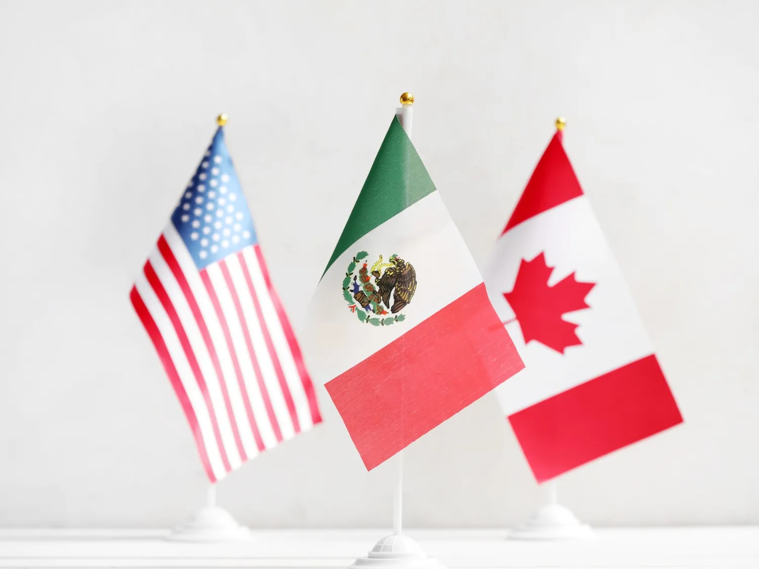 US, Mexican and Canadian flags