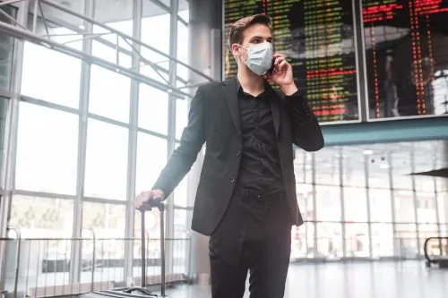 Man at an airport during Covid