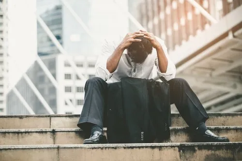 Unhappy person outside