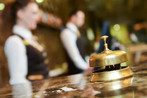 Hotel reception counter desk with bell