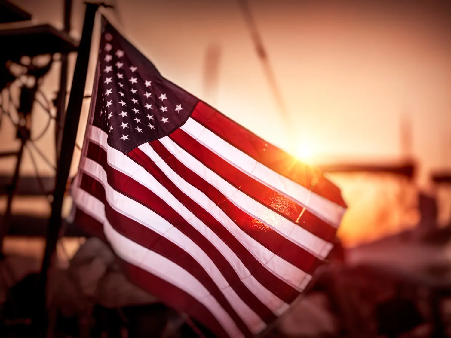Flag of United States of America at sunset