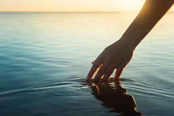 A hand in water